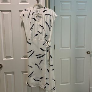 White and blue asymmetrical wrap dress